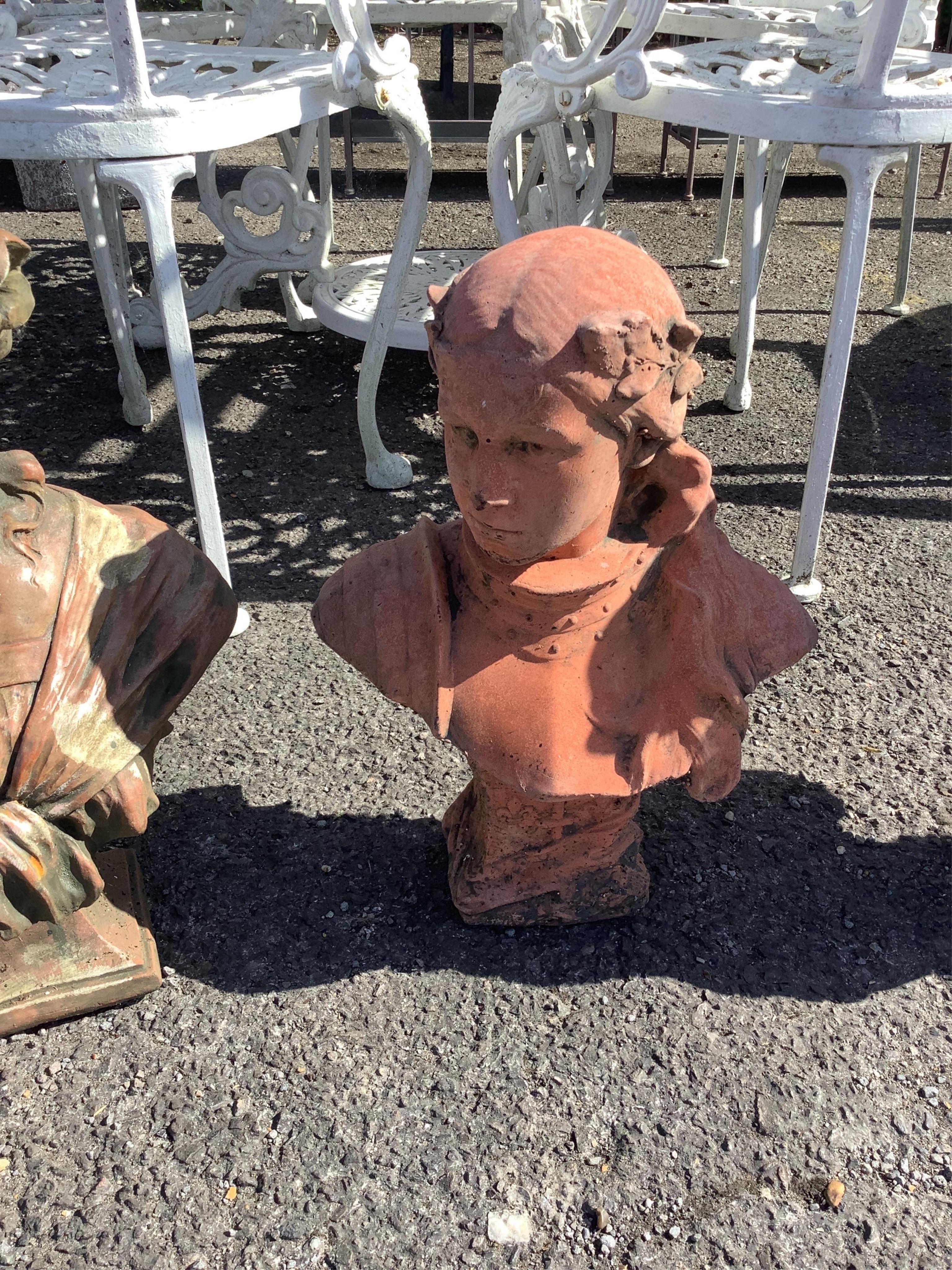 Four cast stone and terracotta garden busts, largest height 46cm
